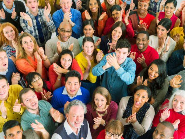 Large group of people in colorful outfits