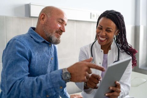 Newsroom Doctor reviewing results with patient